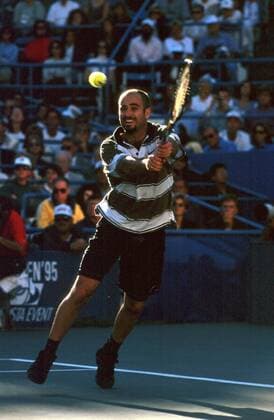 Andre Agassi (USA) - beidhändige Rückhand Tennis Herren US-Open 1995, Grand Slam, ATP-Tour, Hartplatz, Hardcourt, Halbfinale Einzelbild Flushing Meadow New York Dynamik,