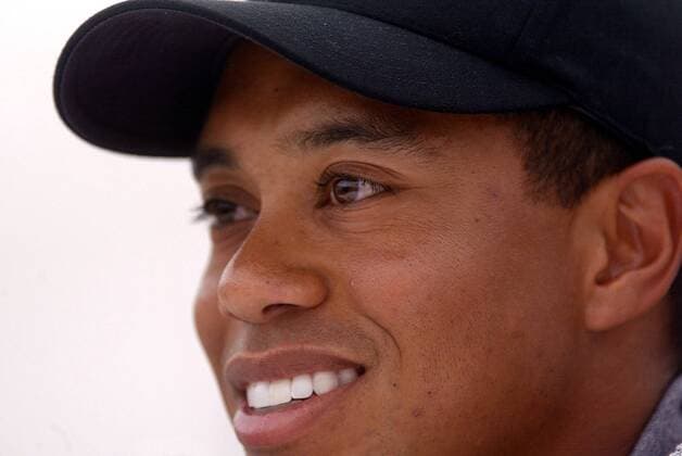 Eldrick Tiger Woods (USA) strahlt Golf Herren Deutsche Bank SAP Open 2002, TPC of Europe, Golfen, Profigolf, Golfprofi, Golfprofis, Profi, Profis Porträt St. Leon-Rot Heidelberg Freude,