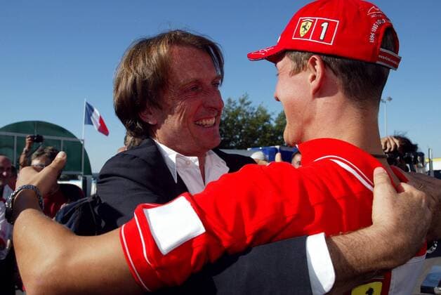 Präsident Luca di Montezemolo (Italien) und der frischgebackene Weltmeister Michael Schumacher (Deutschland beide Ferrari) bejubeln den Titelgewinn Motorsport Grand Prix Herren Großer Preis von Frankreich 2002, Formel 1 Weltmeisterschaft, F1, F, GP, WM, Vdig Gruppe Circuit de Nevers Magny-Cours Glück, Freude, Begeisterung