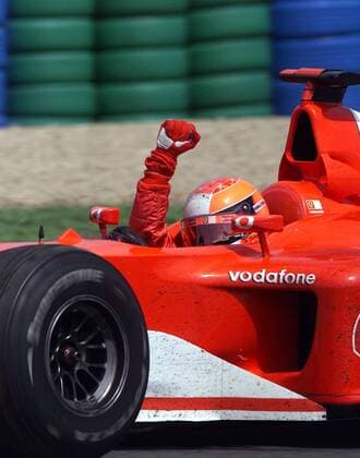 Weltmeister Michael Schumacher (Deutschland Ferrari) - Siegesjubel im Rennwagen Motorsport Grand Prix Herren Großer Preis von Frankreich 2002, Formel 1 Weltmeisterschaft, F1, F, GP, WM, Vdig Einzelbild Circuit de Nevers Magny-Cours Freude,