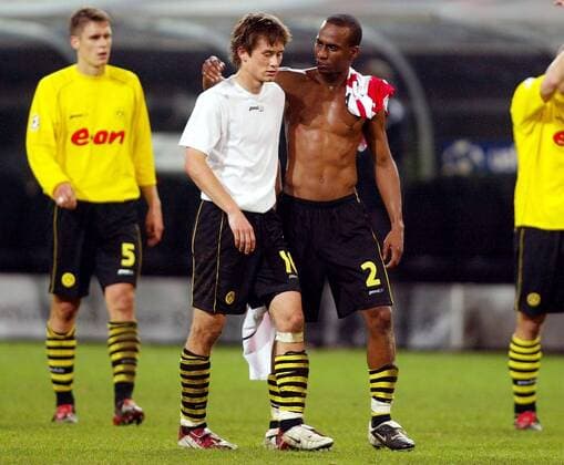 Evanilson (re.) tröstet Tomas Rosicky (beide BVB) Fußball EC 1 Herren Champions League 2002 2003, Borussia Dortmund - PSV Eindhoven 1:1, Gruppe Westfalenstadion Dortmund Enttäuschung,