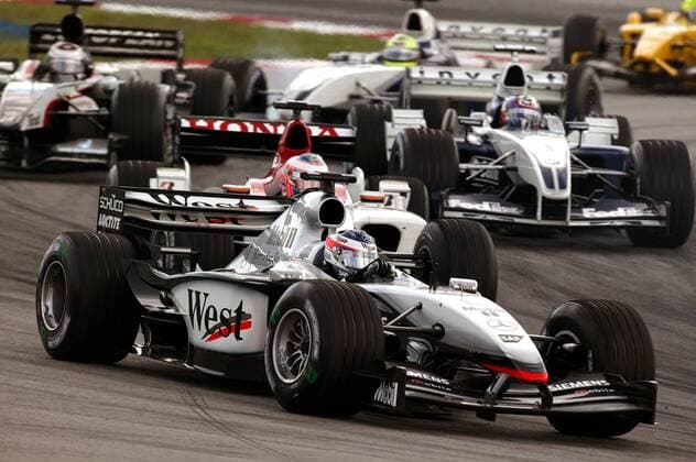 Kimi Räikkönen (Finnland McLaren-Mercedes) in seinem Boliden Motorsport Grand Prix Herren Großer Preis von Malaysia 2003, Formel 1 Weltmeisterschaft, F1, F, GP, WM, Vdig Gruppe Sepang