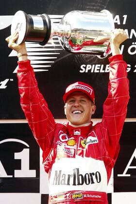 Michael Schumacher (Deutschland Ferrari) mit dem Siegerpokal Motorsport Grand Prix Herren Großer Preis von Österreich 2003, Formel 1 Weltmeisterschaft, F1, F, GP, WM, Vdig Einzelbild A1-Ring Zeltweg-Spielberg Begeisterung, Freude,