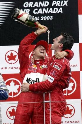 Michael Schumacher (Deutschland) feiert seinen Sieg mit Renningenieur Chris Dyer (Australien beide Ferrari) Motorsport Grand Prix Herren Großer Preis von Kanada 2003, Formel 1 Weltmeisterschaft, F1, F, GP, WM, Vdig Gruppe Montreal Freude, Begeisterung,