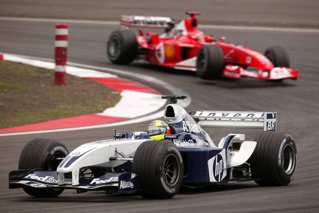 Ralf Schumacher (BMW-Williams) vor seinem Bruder Michael (Ferrari beide Deutschland) Motorsport Grand Prix Herren Großer Preis von Europa 2003, Formel 1 Weltmeisterschaft, F1, F, GP, WM , Vdig Einzelbild Nürburgring Nürburg