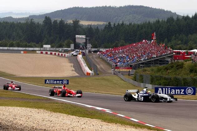 Ralf Schumacher (BMW-Williams) vor Michael Schumacher (beide Deutschland) und Rubens Barrichello (Brasilien beide Ferrari) Motorsport Grand Prix Herren Großer Preis von Europa 2003, Formel 1 Weltmeisterschaft, F1, F, GP, WM , Vdig Totale Nürburgring Nürburg