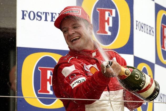Rubens Barrichello (Brasilien Ferrari) bei der obligatorischen Champagnerdusche Motorsport Grand Prix Herren Großer Preis von England 2003, Formel 1 Weltmeisterschaft, F1, F, GP, WM, Einzelbild Silverstone Begeisterung, Freude,