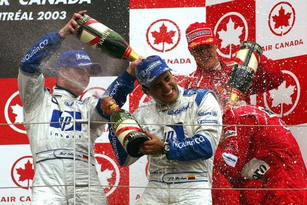 Siegerehrung beim Großen Preis von Kanada 2003: V.li.: Ralf Schumacher (Deutschland), Juan Pablo Montoya (Kolumbien beide BMW-Williams) und Michael Schumacher (Deutschland Ferrari) Motorsport Grand Prix Herren Großer Preis von Kanada 2003, Formel 1 Weltmeisterschaft, F1, F, GP, WM, Vdig Gruppe Montreal Freude,