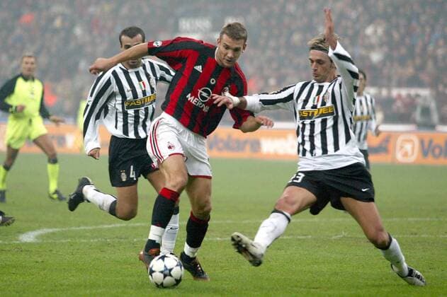 Andrej Schewtschenko (Milan, Mitte) gegen Nicola Legrottaglie (Juve, re.) Fußball Herren Serie A 2003 2004, 1. Italienische Liga, AC Mailand - Juventus Turin 1:1 Gruppe Mailand Dynamik,