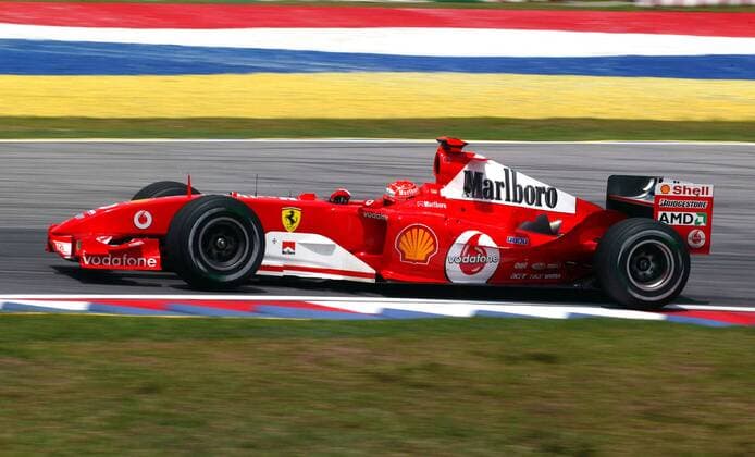 Michael Schumacher (Deutschland Ferrari) in seinem Boliden Motorsport Grand Prix Herren Großer Preis von Malaysia 2004, Formel 1 Weltmeisterschaft, F1, F, GP, WM, Vdig Einzelbild Sepang Kuala Lumpur Dynamik,