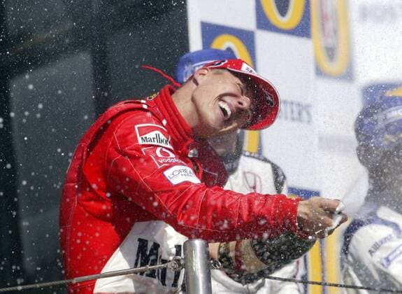 Michael Schumacher (Deutschland Ferrari) - Sektdusche Motorsport Grand Prix Herren Großer Preis von San Marino 2004, Formel 1 Weltmeisterschaft, F1, F, GP, WM, Einzelbild Imola Freude, Begeisterung