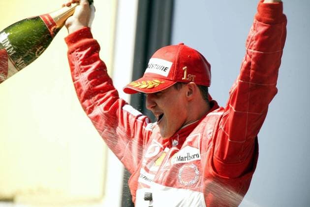 Michael Schumacher (Deutschland Ferrari) feiert seinen Sieg beim Großen Preis von San Marino Motorsport Grand Prix Herren Großer Preis von San Marino 2004, Formel 1 Weltmeisterschaft, F1, F, GP, WM, Vdig Einzelbild Imola Freude, Begeisterung,
