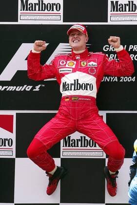 Michael Schumacher (Deutschland Ferrari) - Freudensprung Motorsport Grand Prix Herren Großer Preis von Spanien 2004, Formel 1 Weltmeisterschaft, F1, F, GP, WM Einzelbild Circuit de Catalunya Barcelona Begeisterung, Freude,