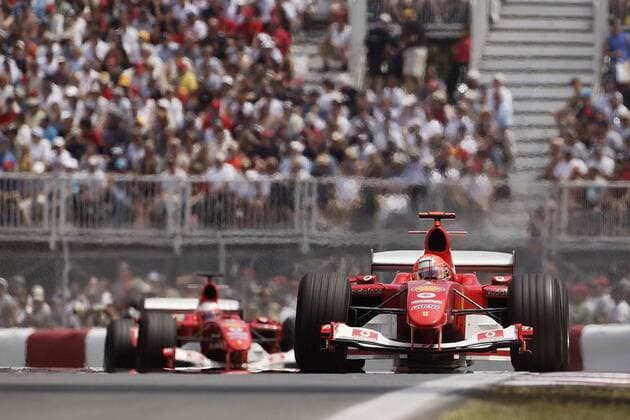 Michael Schumacher (Deutschland) in seinem Boliden vor Barrichello (Brasilien beide Ferrari) Motorsport Grand Prix Herren Großer Preis von Kanada 2004, Formel 1 Weltmeisterschaft, F1, F, GP, WM, Vdig Gruppe Montreal