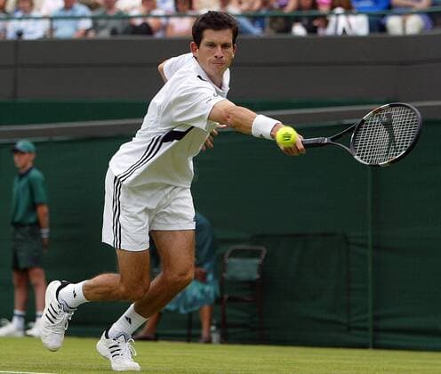 Tim Henman (Großbritannien) - Rückhand Tennis Herren All England Championships 2004, Grand Slam, ATP-Tour, Rasen, Rasenplatz, Rasentennis, Rasenturnier, Einzelbild Wimbledon London Dynamik