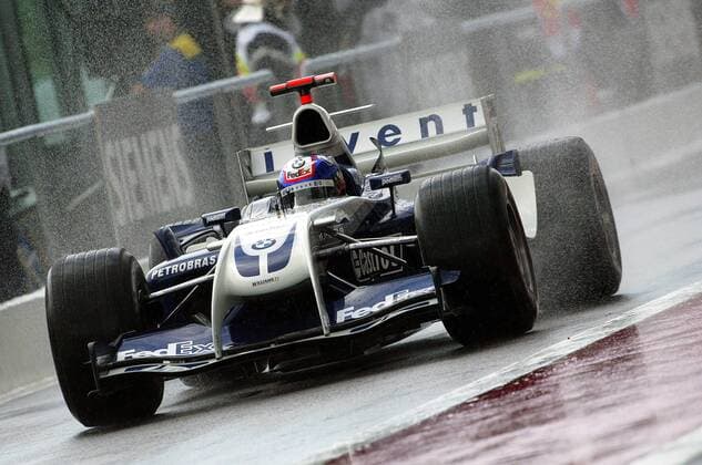 Juan Pablo Montoya (Kolumbien BMW-Williams) in seinem Boliden Motorsport Grand Prix Herren Großer Preis von Frankreich 2004, Formel 1 Weltmeisterschaft, F1, F, GP, WM, Freies Training Einzelbild Circuit de Nevers Magny-Cours