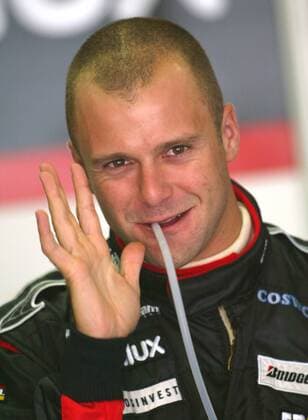 Gianmaria Bruni (Italien Minardi Cosworth) trinkt einen Schluck Motorsport Grand Prix Herren Großer Preis von Frankreich 2004, Formel 1 Weltmeisterschaft, F1, F, GP, WM, Qualifying Einzelbild Circuit de Nevers Magny-Cours Freude,