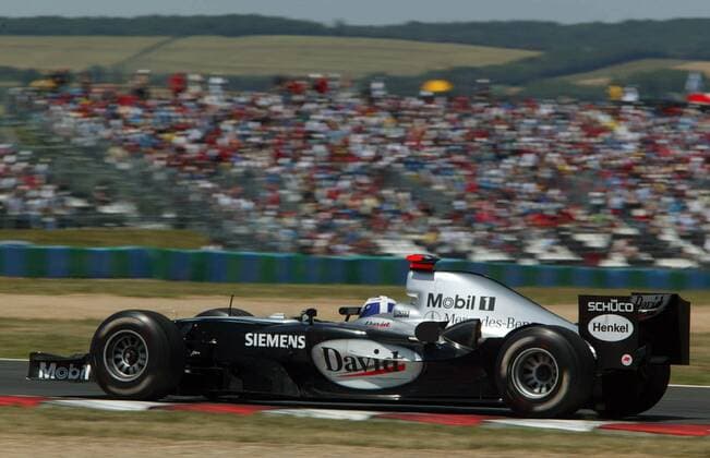 David Coulthard (Schottland McLaren-Mercedes) in seinem Boliden Motorsport Grand Prix Herren Großer Preis von Frankreich 2004, Formel 1 Weltmeisterschaft, F1, F, GP, WM Einzelbild Magny-Cours