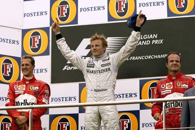 Siegerehrung Spa 2004 - Kimi Räikkönen (Mitte, Finnland McLaren-Mercedes) gewann vor Michael Schumacher (li., Deutschland) und Rubens Barrichello (Brasilien beide Ferrari) Motorsport Grand Prix Herren Großer Preis von Belgien 2004, Formel 1 Weltmeisterschaft, F1, F, GP, WM, Vdig Gruppe Spa-Francorchamps Freude,
