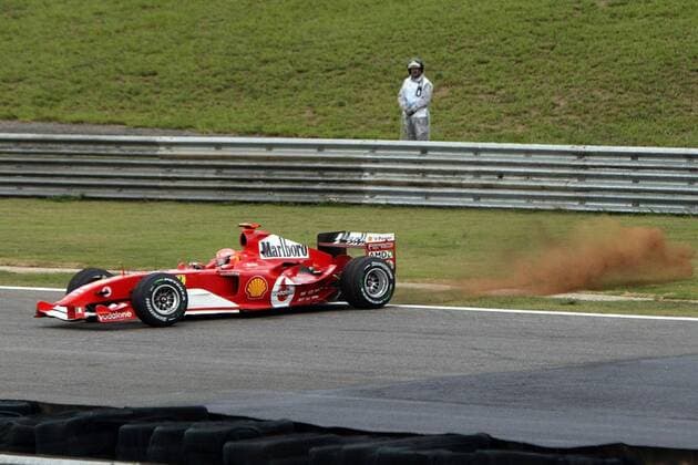 Michael Schumacher (Deutschland Ferrari) - Dreher Motorsport Grand Prix Herren Großer Preis von Brasilien 2004, Formel 1 Weltmeisterschaft, F1, F, GP, WM, Einzelbild Sao Paulo Interlagos Dynamik