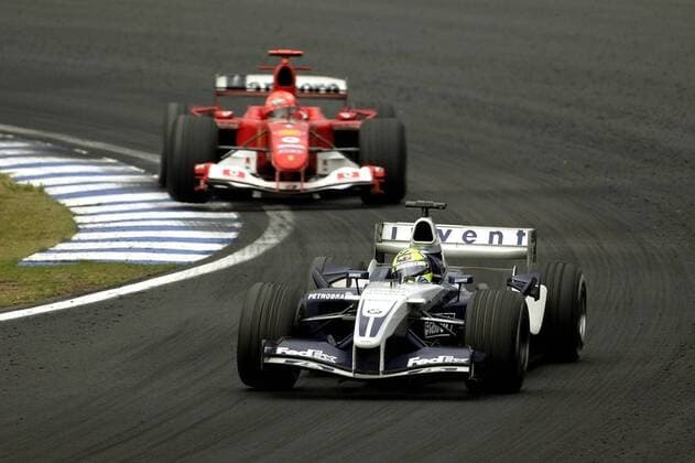 Ralf Schumacher (BMW Williams) vor seinem Bruder Michael (beide Deutschland Ferrari) Motorsport Grand Prix Herren Großer Preis von Brasilien 2004, Formel 1 Weltmeisterschaft, F1, F, GP, WM, Gruppe Sao Paulo Interlagos