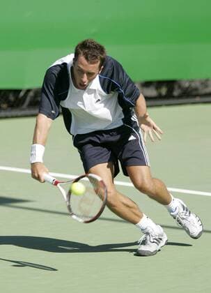 Philipp Kohlschreiber (Deutschland) - Rückhand Tennis Herren Australian Open 2005, ATP Tour, Grand Slam, Hartplatz, Hardcourt, Hartplatztennis, Hartplatzturnier Einzelbild Melbourne Dynamik,