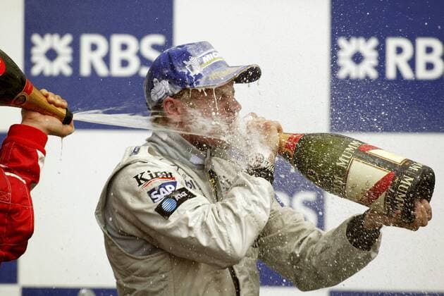 Sieger Kimi Räikkönen (Finnland McLaren Mercedes) genießt die Champagnerdusche nach seinem Erfolg beim Großen Preis von Kanada 2005 Motorsport Grand Prix Herren Großer Preis von Kanada 2005, Formel 1 Weltmeisterschaft, F1, F, GP, WM, Vdig, Einzelbild Montreal Begeisterung, Freude,