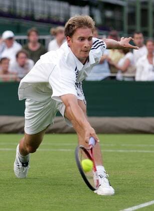 Florian Mayer (Deutschland) - Vorhandvolley Tennis Herren All England Championships 2005, Grand Slam, ATP Tour, Rasen, Rasenplatz, Rasentennis, Rasenturnier Einzelbild Wimbledon London Dynamik,