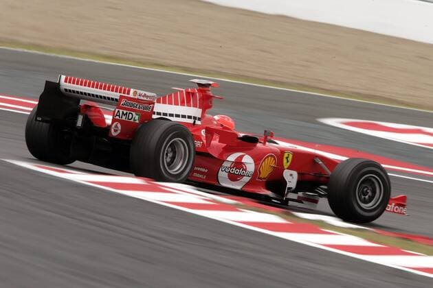 Michael Schumacher (Deutschland Ferrari) in seinem Boliden Motorsport Grand Prix Herren Großer Preis von Frankreich 2005, Formel 1 Weltmeisterschaft, F1, F, GP, WM Einzelbild Circuit de Nevers Magny-Cours Dynamik,
