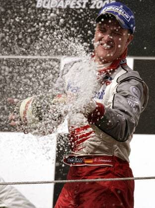 Siegerehrung beim GP von Ungarn 2005: Ralf Schumacher (Deutschland Toyota) bei der obligatorischen Sektdusche Motorsport Grand Prix Herren Großer Preis von Ungarn 2005, Formel 1 Weltmeisterschaft, F1, F, GP, WM Einzelbild Hungaroring Budapest Freude, Begeisterung,