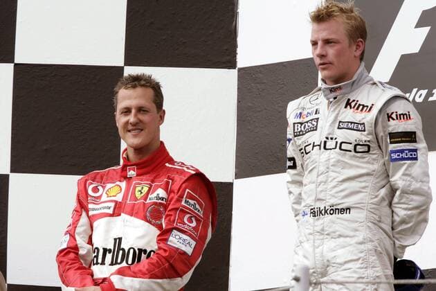 Siegerehrung nach dem GP von Ungarn 2005: Kimi Räikkönen (Finnland McLaren Mercedes, re.) gewinnt vor Michael Schumacher (Deutschland Ferrari) Motorsport Grand Prix Herren Großer Preis von Ungarn 2005, Formel 1 Weltmeisterschaft, F1, F, GP, WM Gruppe Hungaroring Budapest