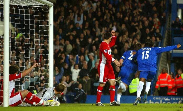 Didier Drogba (re.) und John Terry (2.v.re., beide Chelsea) drehen nach dem 1:0 jubelnd ab, Torwart Mark Schwarzer und Fabio Rochemback (li., beide Middlesbrough) liegen bedröppelt im Tor -  Fußball Herren English Premier League 2005 2006, 1. Englische Liga, Chelsea FC London - FC Middlesbrough 1:0 Gruppe London Freude,