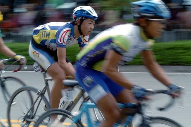 Ein Teilnehmer der 10. Shenzhen Tour in der Guangdong Province -  Radsport Herren 10. Shenzhen Tour 2005, Straßenradsport, Straße, Rad Gruppe IMCp05658508 Shenzhen Dynamik,