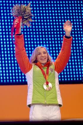 Anni Friesinger (Deutschland) jubelt über ihre Bronzemedaille bei den Olympischen Spielen 2006 in Turin Eisschnellauf OS Winter Damen Olympische Spiele Turin 2006, Winterspiele, 1000m, 1000 m Einzelbild Medals Plaza Turin Freude,