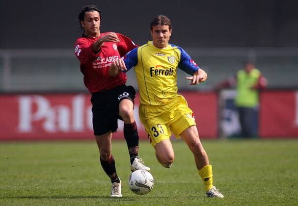 Matteo Brighi (re., Chievo Verona) gegen Raffaele Palladino (Livorno) -  Fußball Herren Serie A 2005 2006, 1. Italienische Liga, AC Chievo Verona - AS Livorno 2:1, Vdig Gruppe Verona Dynamik,