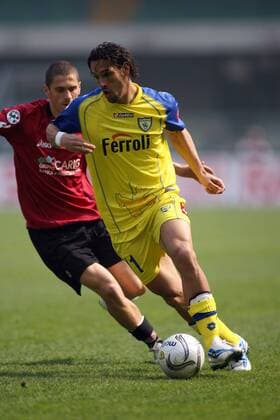 Carvalho de Oliveira Amauri (re., Chievo Verona) gegen Stefano Morrone (Livorno) -  Fußball Herren Serie A 2005 2006, 1. Italienische Liga, AC Chievo Verona - AS Livorno 2:1, Vdig Gruppe Verona Dynamik,