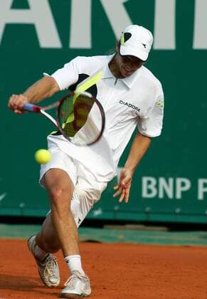 Gaston Gaudio (Argentinien) - Rückhand Tennis Herren Monte Carlo Open 2006, ATP Tour, Masters Series, Sand, Sandplatz, Sandplatztennis, Sandplatzturnier Einzelbild Monte Carlo Dynamik,