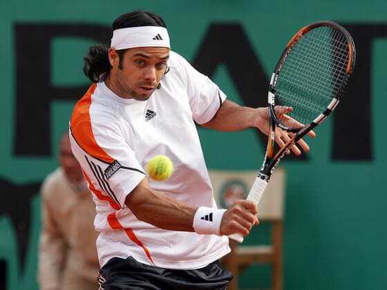 Fernando Gonzalez (Chile) - Rückhandslice Tennis Herren French Open 2006, ATP Tour, Grand Slam, Einzelbild Roland Garros Paris