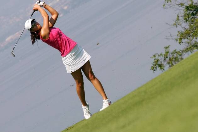 Michelle Wie (USA) schaut ihrem Schlag hinterher, dahinter der Genfer See -  (pan15380) Golf Damen Evian Masters 2006, LPGA Tour, Frauen, Frauengolf Einzelbild Evian les Bains Golf Damen Evian Masters 2006, LPGA Tour, Frauen, Frauengolf Einzelbild Evian les Bains  
