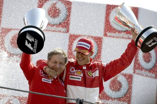 Siegerehrung nach dem GP von Italien in Monza 2006 - Teamchef Jean Todt (Frankreich, li.) und Sieger Michael Schumacher (Deutschland beide Ferrari) jubeln mit den Pokalen Motorsport Grand Prix Herren Großer Preis von Italien 2006, Formel 1 Weltmeisterschaft, F1, F, GP, WM Gruppe Monza Begeisterung, Freude, Motorsport Grand Prix Herren Großer Preis von Italien 2006, Formel 1 Weltmeisterschaft, F1, F, GP, WM Gruppe Monza Begeisterung, Freude,