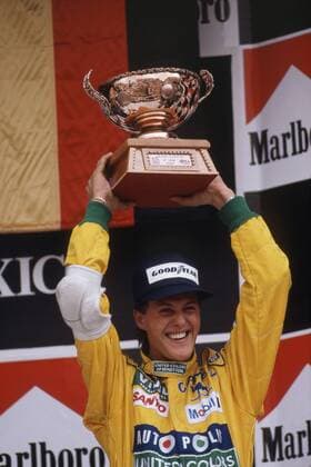 Michael Schumacher (Deutschland Benetton Ford) bejubelt als Dritter beim GP von Mexiko 1992 seine erste Podiumsplatzierung - (2006100319000716) Motorsport Grand Prix Herren Großer Preis von Mexiko 1992, Formel 1 Weltmeisterschaft, F1, F, GP, WM Einzelbild Mexiko City, Stadt Freude, Motorsport Grand Prix Herren Großer Preis von Mexiko 1992, Formel 1 Weltmeisterschaft, F1, F, GP, WM Einzelbild Mexiko City, Stadt Freude,