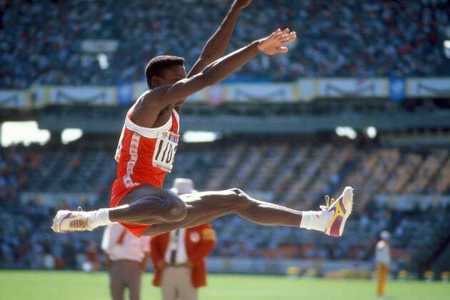 Carl Lewis (USA) Leichtathletik OS Sommer Herren Olympische Spiele Seoul 1988, Sommerspiele, Nationaltrikot Einzelbild Seoul Dynamik, Leichtathletik OS Sommer Herren Olympische Spiele Seoul 1988, Sommerspiele, Nationaltrikot Einzelbild Seoul Dynamik,