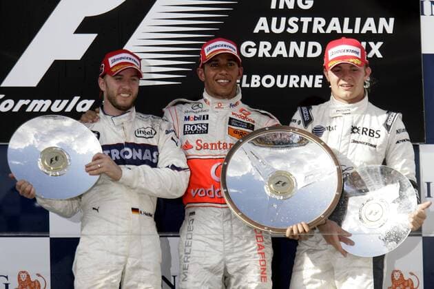 Siegerehrung zum GP von Australien 2008, v.li.: Nick Heidfeld (Deutschland BMW Sauber), Sieger Lewis Hamilton (England McLaren Mercedes) und Nico Rosberg (Deutschland Williams) -  Motorsport Grand Prix Herren Großer Preis von Australien 2008, Formel 1 Weltmeisterschaft, F1, F, GP, WM Gruppe Albert Park Melbourne Motorsport Grand Prix Herren Großer Preis von Australien 2008, Formel 1 Weltmeisterschaft, F1, F, GP, WM Gruppe Albert Park Melbourne