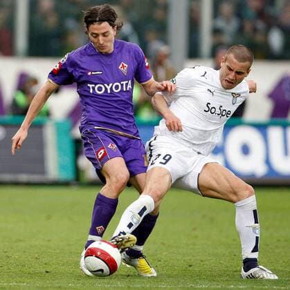 Riccardo Montolivo (AC Florenz, li.) gegen Lorenzo de Silvestri (Lazio Rom) -  Fußball Herren Serie A 2007 2008, 1. Italienische Liga, ACF Fiorentina - Lazio Rom 1:0, Vdig Gruppe Florenz Dynamik, Fußball Herren Serie A 2007 2008, 1. Italienische Liga, ACF Fiorentina - Lazio Rom 1:0, Vdig Gruppe Florenz Dynamik,