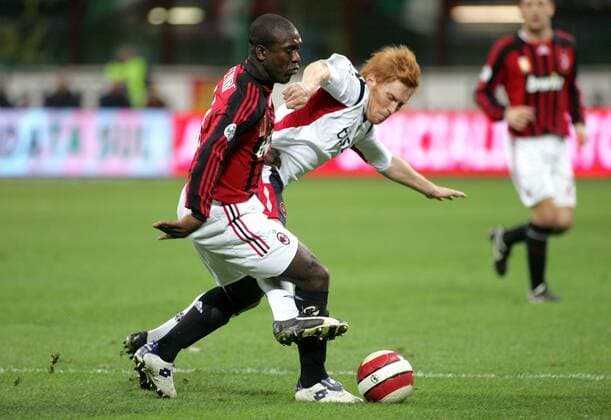 Clarence Seedorf (AC Mailand, li.) gegen Davide Biondini (Cagliari) - Fußball Herren Serie A 2007 2008, 1. Italienische Liga, AC Mailand, Milan - US Cagliari Calcio 3:1 Gruppe Mailand Dynamik, Fußball Herren Serie A 2007 2008, 1. Italienische Liga, AC Mailand, Milan - US Cagliari Calcio 3:1 Gruppe Mailand Dynamik,