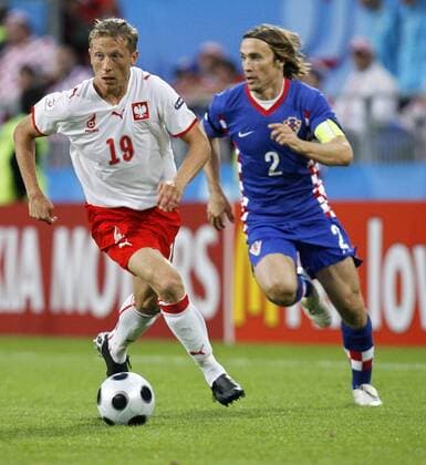 Rafal Murawski (Polen, li.) gegen Dario Simic (Kroatien) -  Fußball EM Herren Euro 2008, Länderspiel, Nationalmannschaft, Nationaltrikot, Kroatien - Polen Gruppe Klagenfurt Dynamik, Fußball EM Herren Euro 2008, Länderspiel, Nationalmannschaft, Nationaltrikot, Kroatien - Polen Gruppe Klagenfurt Dynamik,