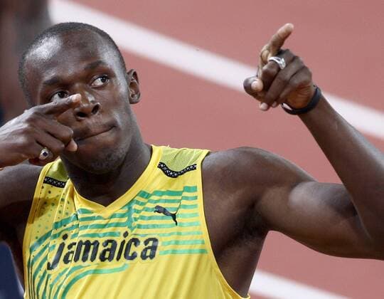 Usain Bolt (Jamaika) jubelt -  Leichtathletik OS Sommer Herren Olympische Spiele 2008, Sommerspiele, 200m, Nationaltrikot Einzelbild Beijing Begeisterung, Freude,