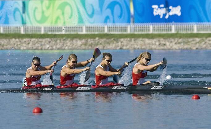 Viererkajak Deutschland - V.re. Fanny Fischer, Nicole Reinhardt, Katrin Wagner Augustin, Conny Wassmuth Kanu OS Sommer Damen Olympische Spiele 2008, Sommerspiele, Kanusport, Vierer, Kajak, Viererkajak, K4, K 4 4er er 500m Einzelbild Nationaltrikot Peking