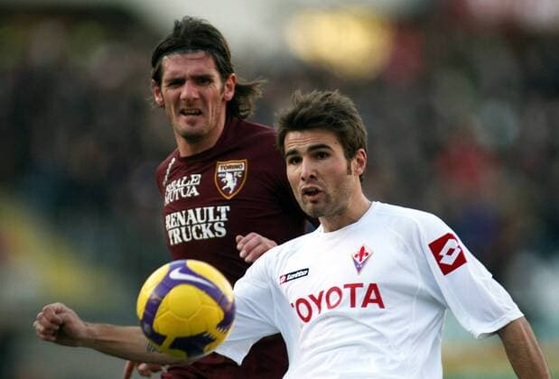 Adrian Mutu (AC Florenz, re.) gegen Marco Di Loreto (FC Turin) -  Fußball Herren Serie A 2008 2009, 1. Italienische Liga, Torino FC - ACF Fiorentina Gruppe Turin Dynamik,