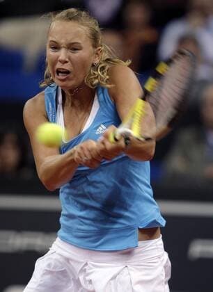 Caroline Wozniacki (Dänemark) Tennis Damen Porsche Grand Prix 2009, WTA Tour Einzelbild Stuttgart Anstrengung, Dynamik,